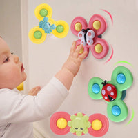 Jouet bébé Ventouse Spinner. Jouet éducatif pour bébé. Wol.Bos